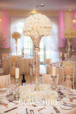 Large Silver Vases with Ivory Roses for hire by Bows Hire