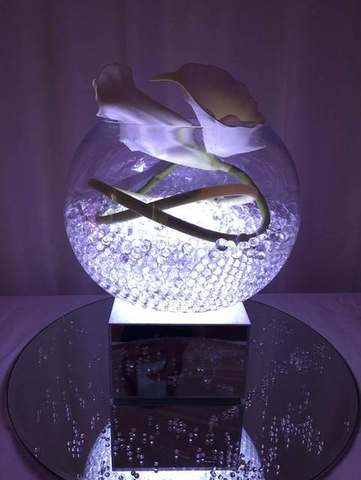 Bubble Bowl with Lilies and Light for hire, centrepieces by Bows Hire
