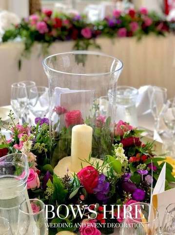 Hurricane Vase with Pillar Candle for hire, centrepieces by Bows Hire