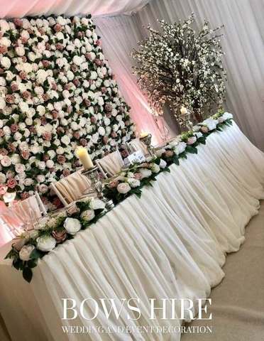 Ivory Voile Waterfall Drape for hire, finishing touches by Bows Hire