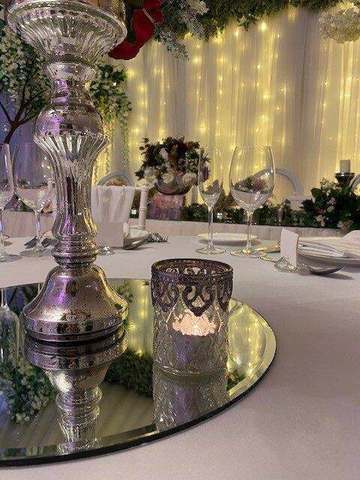 Large Glass Antique Tea-light with Silver Trim for hire, finishing touches by Bows Hire
