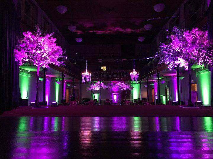 Corporate event with uplit trees